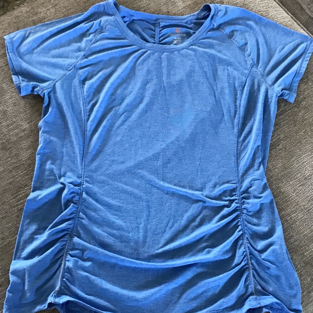 XL Blue t-shirt with pleats at the side and back.